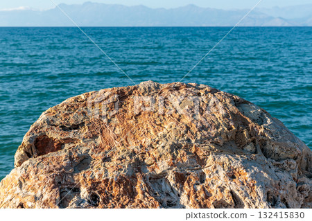Large rocks in the artificial harbor bay near the village of Roda on the island of Corfu Large rocks in the artificial harbor bay near the village of Roda on the island of Corfu 132415830