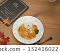 Bear's meal and a colorful autumn dinner table 132416022