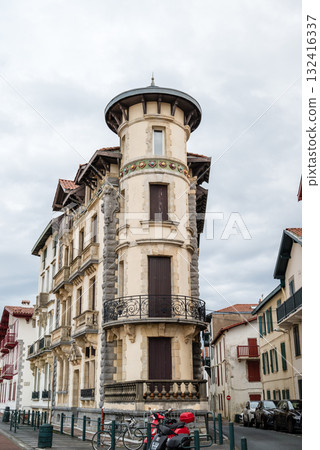 A street lined with historic red and white buildings in Saint-Jean-de-Luz, Basque Country, France A street lined with historic red and white buildings in Saint-Jean-de-Luz, Basque Country, France 132416337