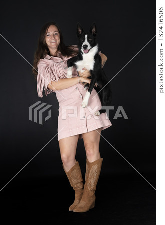 puppy border collie and woman puppy border collie and woman 132416506