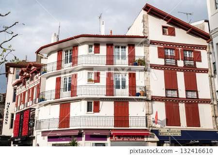 A street lined with historic red and white buildings in Saint-Jean-de-Luz, Basque Country, France 132416610