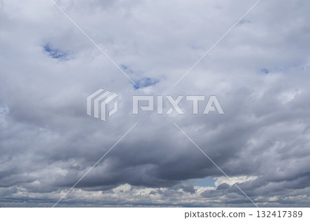 Overcast sky with thick clouds. Overcast sky with dynamic cloud formations. 132417389