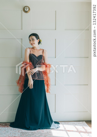 A woman wearing a black wedding dress and makeup 132417392