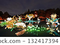 Chinese Garden illuminated at night with colorful figurines reflected on water, Chinese Pavilion 132417394