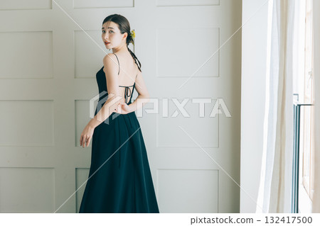 Woman in a black wedding dress 132417500