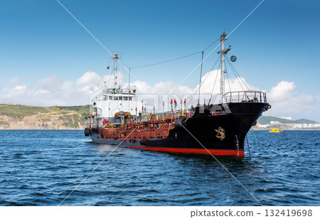 Ship, industrial bulk carrier tanker anchored in sea. Ship, industrial bulk carrier tanker anchored in sea. 132419698