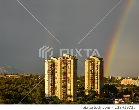 rainbow city skyline, colorful highrises under rainbow, tall buildings glow beneath vibrant rainbow rainbow city skyline, colorful highrises under rainbow, tall buildings glow beneath vibrant rainbow 132419725
