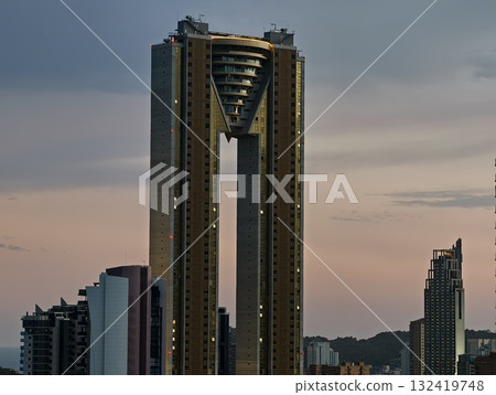 symmetrical tower with bold geometric features, balance of negative space and symmetry in structure symmetrical tower with bold geometric features, balance of negative space and symmetry in structure 132419748