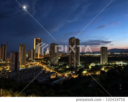 city skyline under moonlight glow, cityscape at dusk with glowing buildings and tranquil city skyline under moonlight glow, cityscape at dusk with glowing buildings and tranquil 132419758