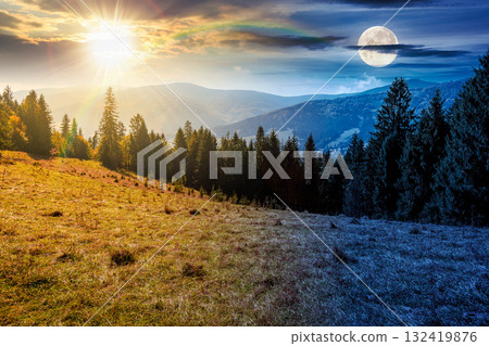 landscape with coniferous forest behind the meadow on autumn equinox. day and night time change concept. nature background with blue sky and mountain ridge with sun and moon. alpine woodland landscape with coniferous forest behind the meadow on autumn equinox. day and night time change concept. nature background with blue sky and mountain ridge with sun and moon. alpine woodland 132419876