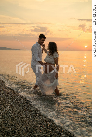 Two Lovers Walking Out Of The Water  132420018