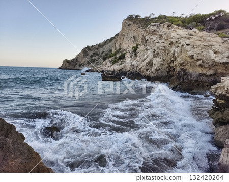 coastal scenery with rocks and surf, spectacular rocky coast with crashing waves and photographer coastal scenery with rocks and surf, spectacular rocky coast with crashing waves and photographer 132420204