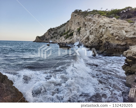 cliffside water crash training, training scenario showcasing powerful waves hitting jagged rocks cliffside water crash training, training scenario showcasing powerful waves hitting jagged rocks 132420205