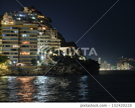 luxury coastal apartments, boutique cliffside resort capturing moonlit skyline and tranquil waters 132420228