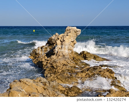 coastal surf collision, dynamic coastal landscape with crashing waves and shimmering wet stones coastal surf collision, dynamic coastal landscape with crashing waves and shimmering wet stones 132420274