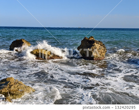 seascape with rocks, twin rocky formations amidst dynamic ocean waves and vibrant spray scene seascape with rocks, twin rocky formations amidst dynamic ocean waves and vibrant spray scene 132420295