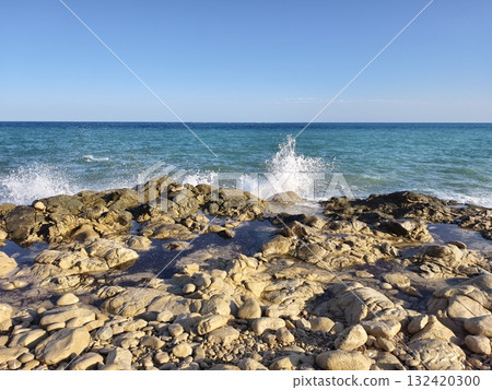 sunlit rocky coast with crashing waves, breathtaking shoreline bursting with energy and sunlight sunlit rocky coast with crashing waves, breathtaking shoreline bursting with energy and sunlight 132420300