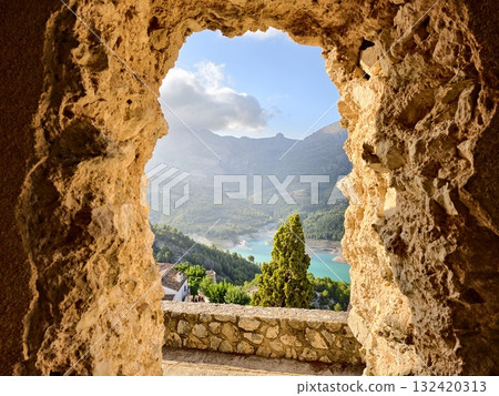 golden sunset illuminating mountain village scenery, rugged landscape with panoramic vistas golden sunset illuminating mountain village scenery, rugged landscape with panoramic vistas 132420313