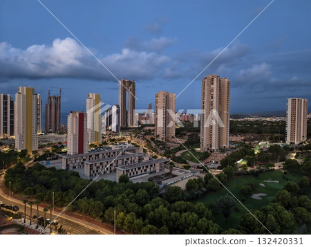 coastal evening scene, panoramic coastal cityscape featuring modern residences and gentle traffic coastal evening scene, panoramic coastal cityscape featuring modern residences and gentle traffic 132420331