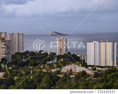 serene sunrise over island resort, tranquil morning scene featuring coastal skyline and lush gardens serene sunrise over island resort, tranquil morning scene featuring coastal skyline and lush gardens 132420335