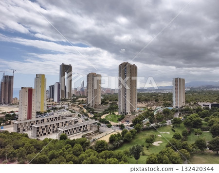 cityscape with greenery, expansive aerial view of city with tall buildings and green spaces cityscape with greenery, expansive aerial view of city with tall buildings and green spaces 132420344