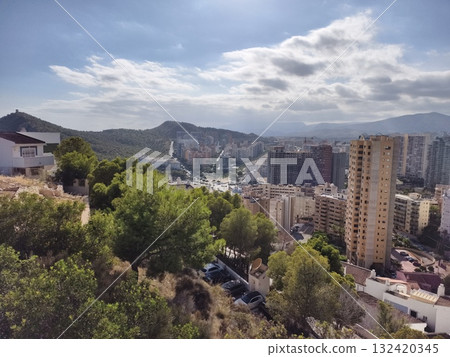house overlooking scenic valley and trees, picturesque hillside view with valley and forest house overlooking scenic valley and trees, picturesque hillside view with valley and forest 132420345