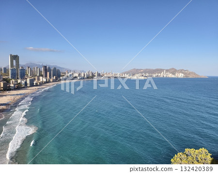 beach city scene, bright seaside urban landscape, sunshine illuminated city and beach views beach city scene, bright seaside urban landscape, sunshine illuminated city and beach views 132420389