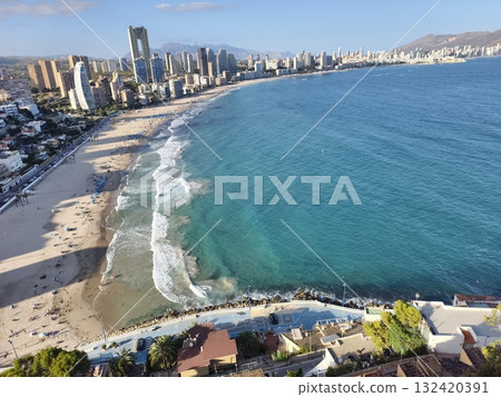 gentle turquoise waters with sandy beaches, serene shallow turquoise waters complemented by sandy 132420391