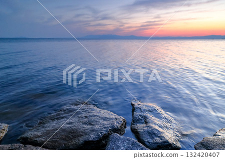 Lake Biwa sunset and calm waves 132420407