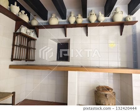 rustic pantry charm, bright rural kitchen storage, sunlit white tiled pantry with rustic items rustic pantry charm, bright rural kitchen storage, sunlit white tiled pantry with rustic items 132420444