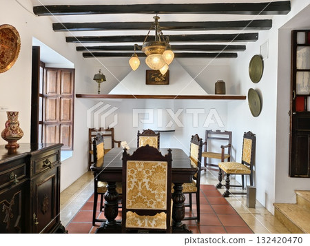 charming country dining, inviting country dining room featuring chandelier and terracotta flooring charming country dining, inviting country dining room featuring chandelier and terracotta flooring 132420470