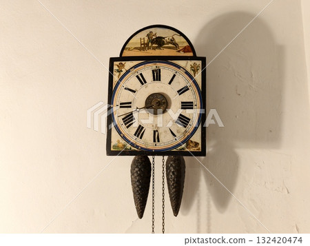 ornate painted chaletstyle pendulum clock, heritage handcrafted clock with floral dial and roman 132420474