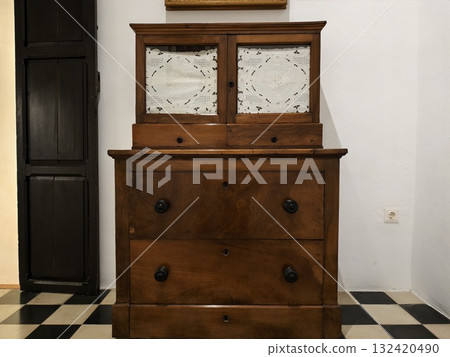 elegant vintage furniture, classic walnut dresser with mirrored cabinet and traditional details elegant vintage furniture, classic walnut dresser with mirrored cabinet and traditional details 132420490