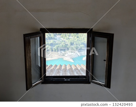 seaside view scene, coastal bay with boats, wooden window overlooking tranquil seaside landscape seaside view scene, coastal bay with boats, wooden window overlooking tranquil seaside landscape 132420493