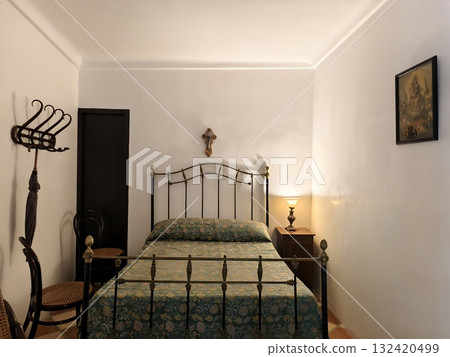 elegant vintage bedroom with warm lighting and timeless decor creating tranquil atmosphere 132420499