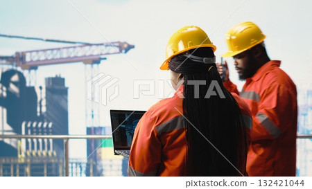 Offshore platform worker using AI LLM to analyze subsea mapping data. Drilling rig engineer using predictive artificial intelligence model to assess subsea topology Offshore platform worker using AI LLM to analyze subsea mapping data. Drilling rig engineer using predictive artificial intelligence model to assess subsea topology 132421044