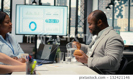 HR experts team evaluating a candidate profile and CV during meeting, reviewing qualifications and professional experience before the selection of perfect applicant. Talent acquisition. 132421146