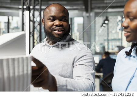 Property engineers establishes zoning regulations with 3D models, making site preparation for residential project and urban development. Design innovation into urban planning process. Property engineers establishes zoning regulations with 3D models, making site preparation for residential project and urban development. Design innovation into urban planning process. 132421228