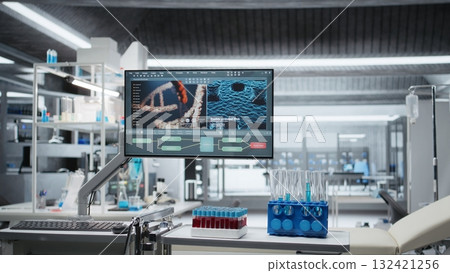 Empty lab filled with modern research equipment and computer screens ready for observation, testing and analysis. Symbolizing innovation and biotechnology development in healthcare and biomedicine. 132421256