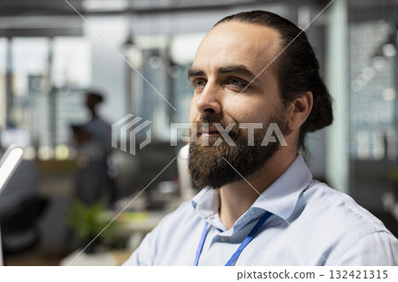 Close up of equity analyst working for proprietary firm reading annual company reports to evaluate stock shares volatility. Financial specialist conducts research to gain stock exchange insights Close up of equity analyst working for proprietary firm reading annual company reports to evaluate stock shares volatility. Financial specialist conducts research to gain stock exchange insights 132421315