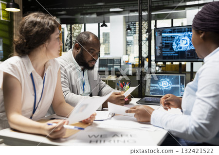 Hiring professionals filtering through candidate CV applications with AI algorithms, applying smart automation and machine learning for selection and decision making. Business innovation. Hiring professionals filtering through candidate CV applications with AI algorithms, applying smart automation and machine learning for selection and decision making. Business innovation. 132421522