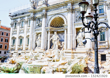 Tourists visiting the famous and magnificent Trevi Fountain in Rome, Italy 132421920