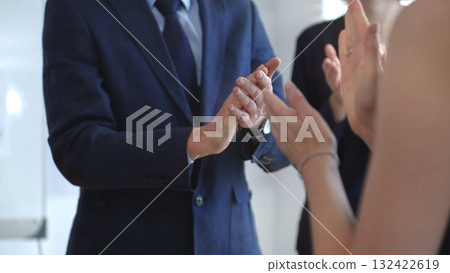 Business people hands clapping, showing applause and appreciation for success and achievement during a corporate event or conference meeting in bright office Business people hands clapping, showing applause and appreciation for success and achievement during a corporate event or conference meeting in bright office 132422619