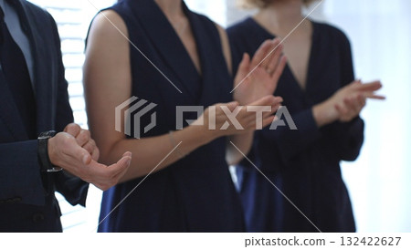 Business people hands clapping, showing applause and appreciation for success and achievement during a corporate event or conference meeting in office 132422627