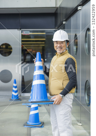 Security guards directing people through the event space Security guards directing people through the event space 132422959