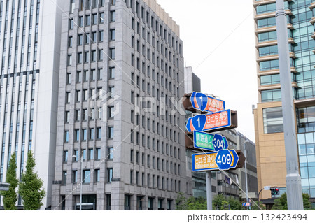Urban landscape with road signs Urban landscape with road signs 132423494