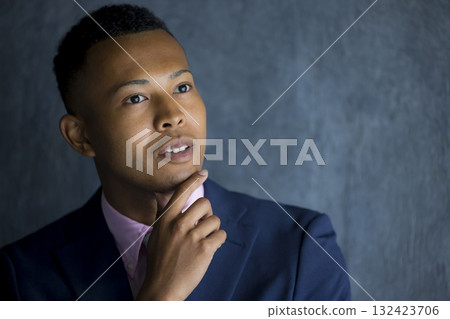 A foreign man wearing a suit and thinking A foreign man wearing a suit and thinking 132423706