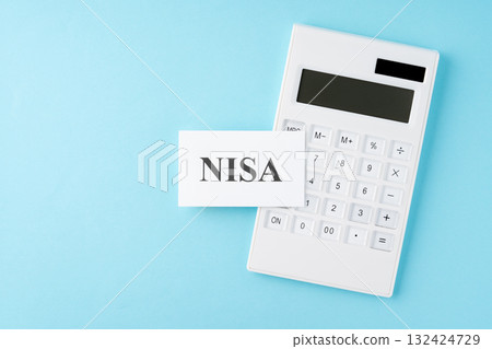 NISA lettering and calculator on a light blue background 132424729