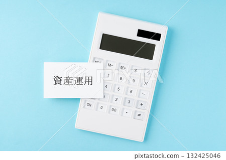 Asset management text and calculator on light blue background 132425046