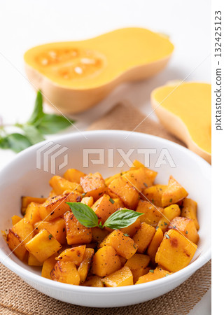Roasted butternut squash pumpkin in a bowl, Autumn homemade food Roasted butternut squash pumpkin in a bowl, Autumn homemade food 132425123